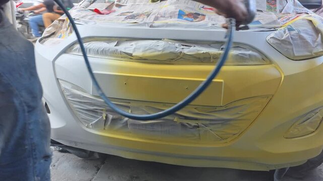 pintando veh&iacute;culos servicio taxi