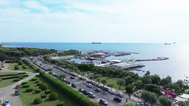 yacht club and pleasure craft harbor right after the impeccably manicured lawn of Casini d'Ardenza, in Livorno, Italy gorgeous Ligurian Sea coastal enclave