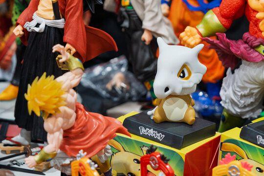 GUAYAQUIL, ECUADOR &ndash; AUG 06, 2023: Cubone Pokemon collectible figure displayed with anime merchandise and toy figures at a Comic Con collectors event