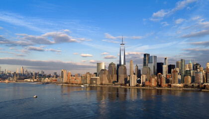Fototapeta premium Manhattan waterfront panorama with modern skyscrapers in New York City, NYC. New York skyline panorama. New York City skyline. Manhattan skyline in New York City.