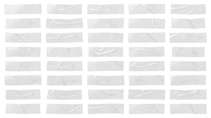 Clear adhesive tape strips with wrinkles and texture, various lengths and shapes, isolated on white