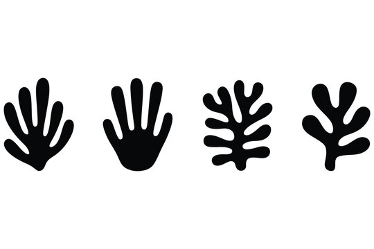 Prehistoric cave paintings of human hands and abstract shapes