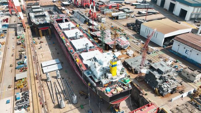 Giant Ships Under Construction at Industrial Shipyard