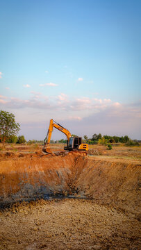 Huai Thalaeng, Thailand &ndash; February 13, 2026 &ndash; A Sany SY135C excavator is working on a pond being dug for agricultural water storage.