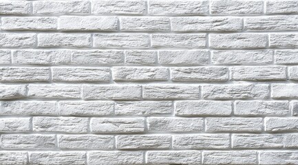 A close-up view of a textured white brick wall, showcasing the intricate patterns and shadows created by the brickwork.