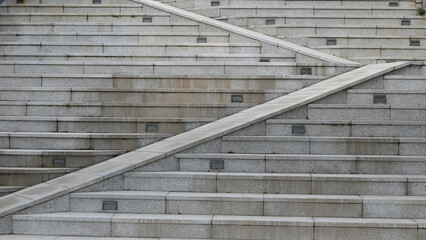 Fototapeta premium Stone Staircase Pattern with Diagonal Ramp in Modern Architecture