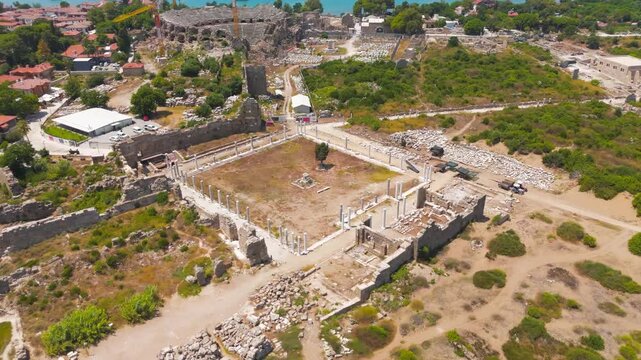 Side, Manavgat, Turkey. Ancient Agora Square archaeological site with colonnades and ruins, Mediterranean coastal location aerial view