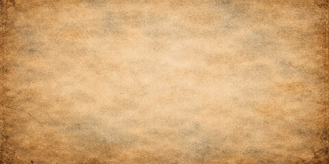 Fototapeta premium A worn vintage brown parchment background featuring a stained grunge paper texture with an aged antique pattern and a blank retro design for a weathered material backdrop