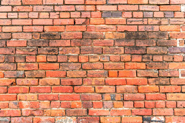 Obraz premium Brick on wall background. Brick in redbrick texture. Brick on masonry surface. Brick rustic backdrop.