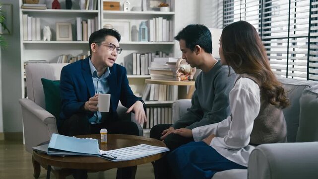 couples therapy session, a marriage counselor consults with a young couple for family therapy, offering relationship counseling, marriage help, family support, anxiety therapy, depression support	