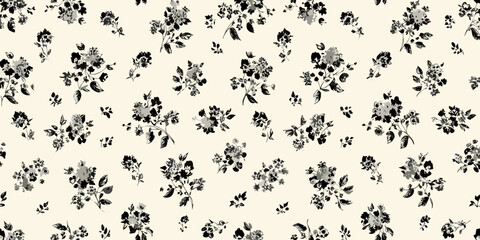 Black floral pattern on a cream colored background delicate and repeating