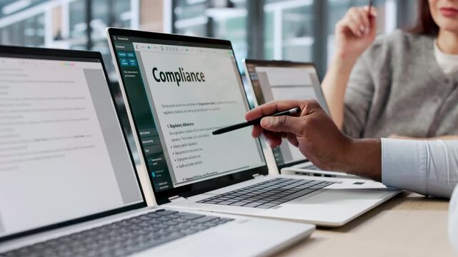 Lawyers Reviewing Compliance Documents