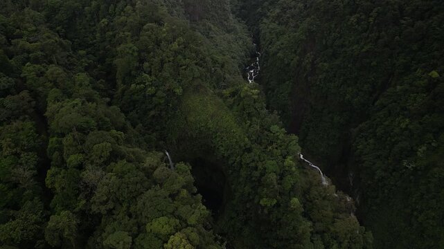 Aerial of hidden waterfall on Rio Toro Quebrada Gata in Costa Rica near Bajos del Toro in lush dense jungle
