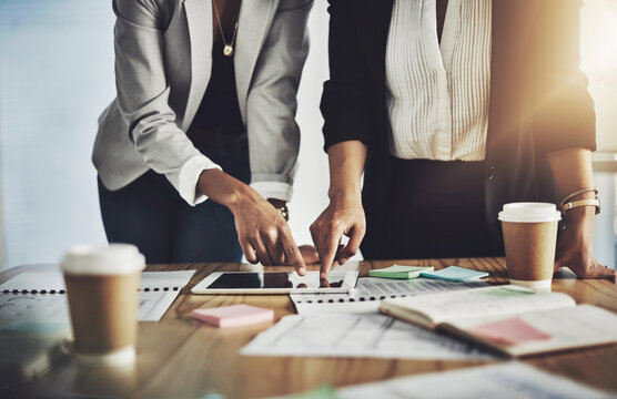 Tablet, planning and hands of people in office, market research team and portfolio review for investing. Pointing, return analysis or asset managers with risk assessment, acquisition strategy or tech