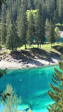 Caumasee Lake Cauma in Switzerland renowned Alpine lake turquoise waters and forested surroundings