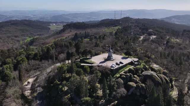 Drone shot of Penha sanctuary Papa Pio IX statue in Guimaraes European green city capital.