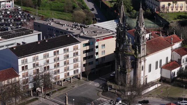 Medium tele drone shot of church nossa senhora da consola&ccedil;ao e santos passos European green city capital.