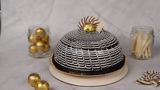 Delicious Choco Zebra Cake featuring beautiful striped layers of chocolate and vanilla sponge that create a unique zebra pattern. This soft and fluffy marble cake combines rich chocolate flavor with s