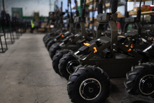 Armed military ground drone in the factory. Production of rodtized complex delivers mine.