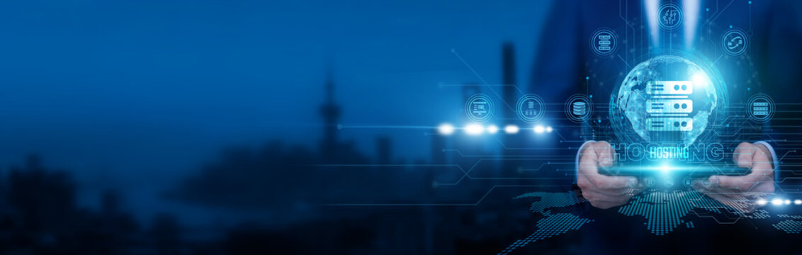 IT administrator holding a touchscreen tablet and pointing at hosting servers on structure cloud networks and data centers. Hosting management ensures uptime, scalability, and secure online services.