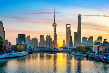 Fototapeta premium Shanghai city and Huangpu river at sunrise, China.