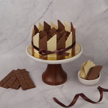 Delicious Coco Brick Choco dessert featuring a rich chocolate flavor presented in a unique brick-style shape. This indulgent sweet treat combines creamy chocolate texture with a dense layered dessert 
