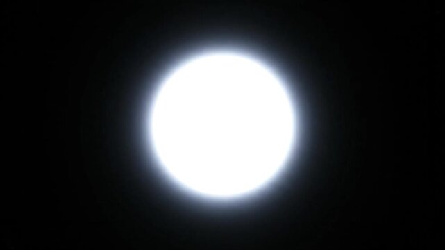 Bright White Moon in Dark Space.