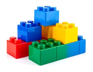 Obraz premium Stack of brightly colored plastic blocks in red, blue, green, and yellow against a white background