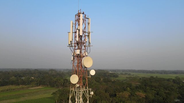 Telecommunications Tower Rising Above Rural Village in Bangladesh
