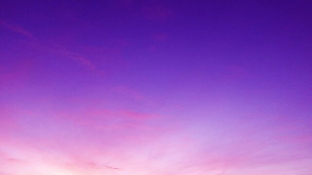Sunrise or sunset magenta purple sky background with colorful red pink clouds or Contrail n condensation trail cloudscape in tropical summer or spring sunlight at sunny day, 4k stop motion TimeLapse