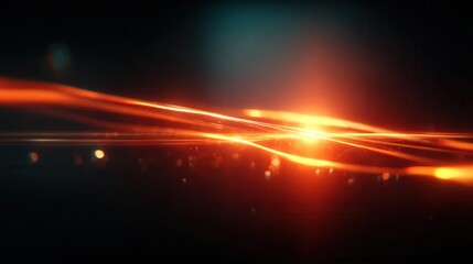 Fototapeta premium Abstract glowing orange light streaks and bokeh on a dark background