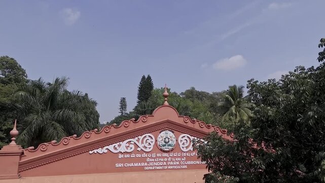 A drone shot capturing the entrance arch of Cubbon Park or Sri Chamarajendra Park in Bengaluru