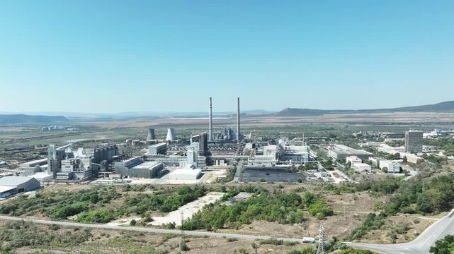 Chemical factory. Chemical plant. Industrial power plant with smokestack