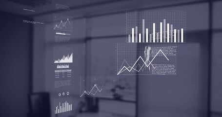 Displaying data panels centering in modern office, showing bar and line charts near desk
