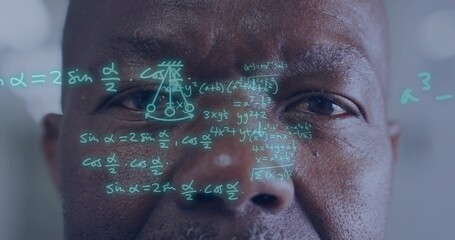 Studying senior man analyzing holographic math overlay on face in lab, with turquoise overlay