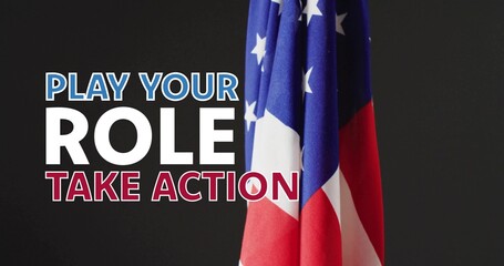 Naklejka premium Draping United States flag vertical at studio art, showing bold PLAY YOUR ROLE headline, copy space