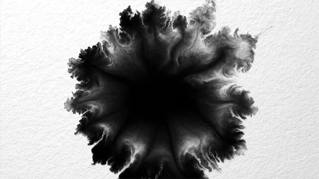 Ink Splashing in Water on White Background.