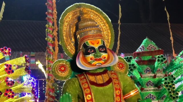 Colorful religious and cultural sculptures displayed in the 'Kavadi' procession of a temple festival in Kerala, India	