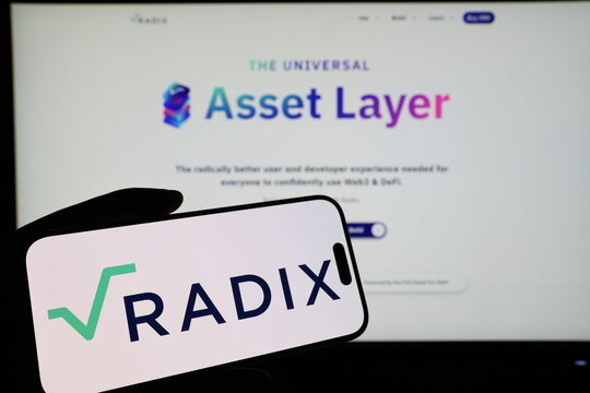 Kiel, Germany - 03-06-2026: Smartphone displaying UK blockchain technology company RDX Works Ltd logo in front of companys webpage