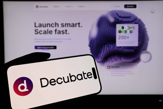 Kiel, Germany - 03-06-2026: Smartphone displaying Dutch crypto launchpad company Decubate.com logo in front of companys webpage