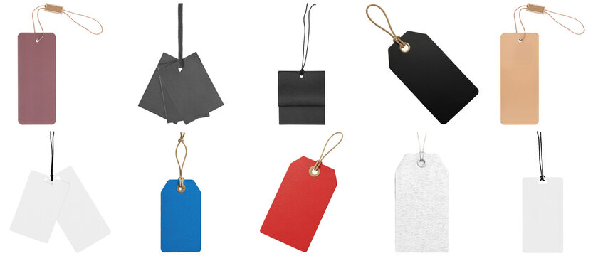 Collection of diverse blank hang tags and price labels in various colors and materials with strings.