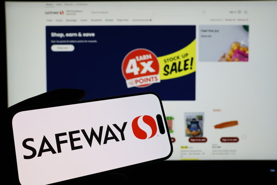 Kiel, Germany - 03-06-2026: Smartphone displaying US supermarket company Safeway logo in front of companys webpage