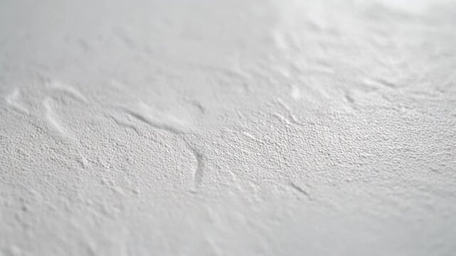 Gray textured surface closeup detail.