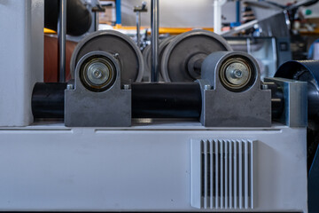 Industrial Pillow Block Bearings with Steel Shaft and Roller Wheels on Production Line