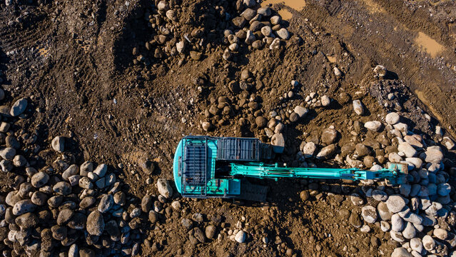 Excavator in Quarry. Mining Operation with Heavy Machinery in Open Pit Quarry, Mining Site View from Above