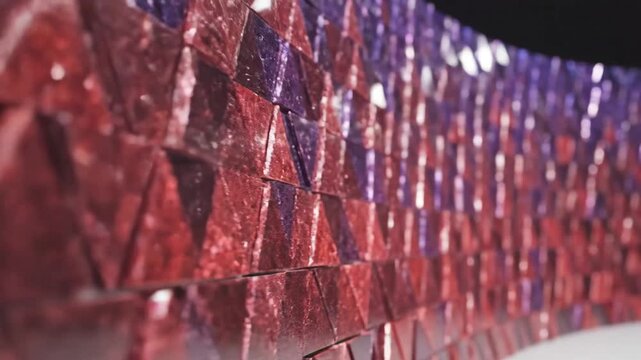 Abstract Geometric Pattern of Red and Purple Sequins Closeup.