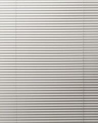Obraz premium Close-up view of white horizontal blinds covering a window with subtle light and shadow patterns