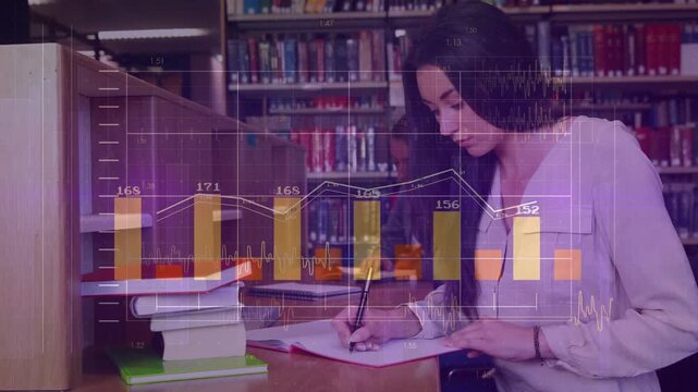 Female student taking notes in spiral notebook at library table as data overlays appear and shift