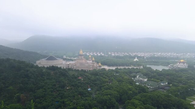 Lingshan Brahma Palace Aerial View with Misty Mountains and River