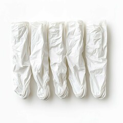 Stack of crumpled white plastic bags in natural lighting for recycling or reuse